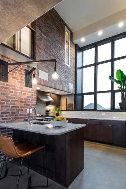 Industrial Loft Kitchen, Industrial Condo, Small House Remodel, Latest Kitchen Trends, Brick Accent Wall, Industrial Kitchen Design, Loft Kitchen, Condo Remodel, U Shaped Kitchen