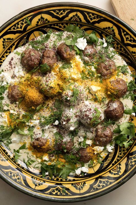 These spice-loaded meatballs have a Turkish inflection The warm yogurt sauce adds tang and richness, along with a sprinkling of tart sumac powder and chopped mint American "Greek-style" yogurt is not always tart enough, but it can be thinned with a bit of buttermilk or even lemon juice Recipes That Go A Long Way, Minced Lamb Recipes, Iberian Recipes, Nytimes Cooking, Lamb Mince Recipes, Sumac Powder, Spiced Meatballs, Turkish Meatballs, Sumac Recipes