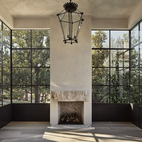 Katie Harbison Tennessee Home Interior, Arched Steel Windows, Modern Heritage Home, Modern Tudor Dining Room, Fireplace With Window Above, Luxury Homestead, Amber Interiors Home, European Contemporary Home, Great Room Windows