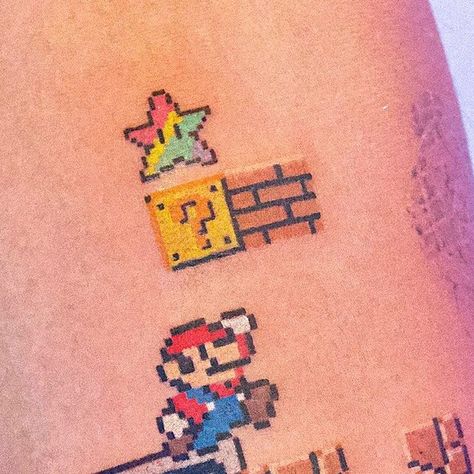 Super Mario Tattoo Design, Porco Rosso Tattoo, Mario Star Tattoo, Luigi Tattoo, Black Eye Galaxy, Super Mario Tattoo, Eye Galaxy, Pixel Tattoo, Mario Tattoo