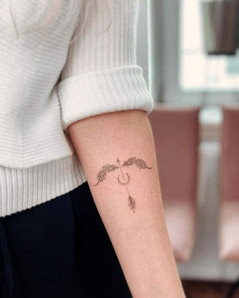 Artemis Arrow Tattoo, Moon Bow And Arrow Tattoo, Minimal Bow And Arrow Tattoo, Moon Sagittarius Tattoo, Moon Arrow Tattoo Design, Mini Bow And Arrow Tattoo, Bow Arrow Tattoos For Women, Minimalist Bow And Arrow Tattoo, Floral Bow And Arrow Tattoo