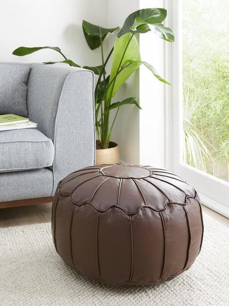 Moroccan piped Faux leather Pouffe in Brown - 50 cm Ideal for adding some extra comfort and luxury to your living room, this Moroccan-inspired footstool features a smooth circular shape and is upholstered in a rich faux leather fabric. Finished in a classic brown shade, it's detailed with piping that helps the panels stand out brilliantly. As well as a footstool, this pouffe also makes a comfy extra seat when visitors pop round. Product size: 50 x 50 28 cm Depth: 50 CM 100% polystrene filling Height: 28 CM Material Content: 85% pu 15% pvc Width: 50 CM wipe clean only Leather Pouffe, Brown Shade, Classic Brown, Brown Shades, Faux Leather Fabric, Extra Seating, Leather Fabric, Piping, Cleaning Wipes