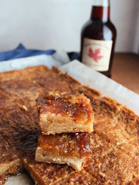 Gooey maple syrup bars feature a delicious maple filling over a simple brown sugar shortbread crust. They have warm and cozy flavors that come together in such a fabulous way. Add nuts if you want, or let the syrup be the star of the show. Maple Syrup Bars, Maple Syrup Desserts, Recipes Using Maple Syrup, Recipes With Maple Syrup, Maple Filling, Brown Sugar Shortbread, Bourbon Maple Syrup, Maple Bars, Maple Syrup Recipes