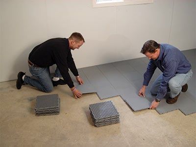 Basement floor matting installation Tile Basement Floor, Basement Subfloor, Basement Flooring Waterproof, Basement Finishing Systems, Concrete Basement Floors, Best Flooring For Basement, Basement Systems, Basement Flooring Options, Wet Basement