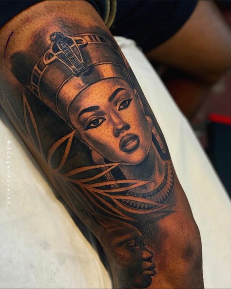 African Related Tattoos, Black Queen Tattoo Sleeve, Black Cleopatra Tattoo, Black African Queen Tattoo, Pisces Shoulder Tattoos For Women, My Black Is Beautiful Tattoo, Afrocentric Tattoos For Women Sleeve, Female Egyptian Tattoo, Black Woman Face Tattoo