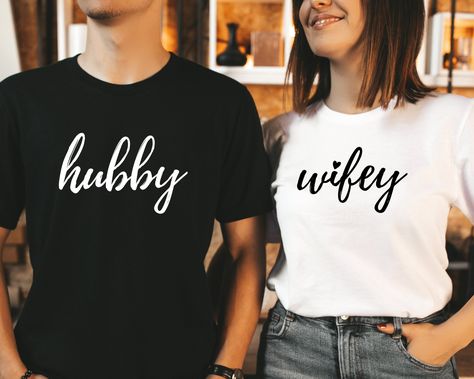 Hubby Wifey Shirts, Honeymoon Shirt, Just Married Shirt, Engagement Shirt, Wedding Shirts, Bridal Gift Engagement, Husband And Wife Shirts Welcome to Style Art US! 𝐒𝐈𝐙E 𝗔ND 𝐂𝐎𝐋𝐎𝐑𝐒: For size and color options, please see listing images. Bella Canvas 100% soft cotton, light fabric (4.2 oz/yd² ) The unisex style ( Bella + Canvas 3001) that runs true for men and a touch large for women. DTF printing method is used for these shirts. 𝗛𝗢𝗪 𝗧𝗢 𝗢𝗥𝗗𝗘𝗥: 𝟏. Please, check and review listi Wedding Gifts For Bride And Groom, Married Shirt, Engaged Shirts, Baby Overall, Mrs Shirt, Honeymoon Shirts, Matching Couple Shirts, Husband Shirts, Wedding Shirts