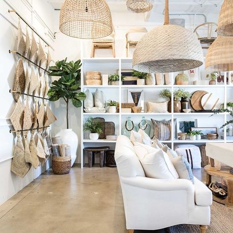 Pure Salt Showroom - Pure Salt Interiors Labor Day Sale - Check out our shoppe to get 15% off site wide till Monday!  #OfficeSpace #OfficeGoals #HomeOffice #GirlBoss #GirlBossOffice #BossBabeOffice #LadyBossOffice #LadyBoss #GirlBoss #BossBabe #Office #OfficeDecor #HomeOfficeIdeas #CuteHomeOffice #CuteOffice #OfficeOrganization #OfficeDesign #HomeOfficeLayout #OfficeLayout Retail Store Design Ideas, Salt Interiors, Pure Salt Interiors, Pure Salt, Coastal Interiors Design, Showroom Interior Design, Boutique Decor, Store Interiors, Rattan Pendant Light