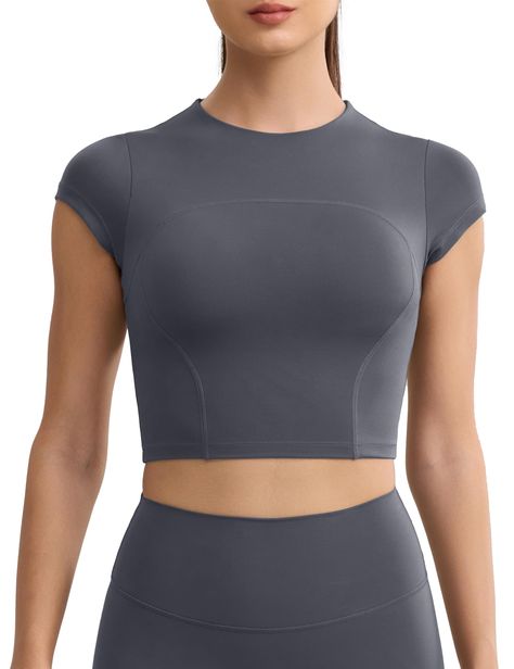 PRICES MAY VARY. Cream Collection Tops: Workout crop tops are made from skin-friendly, 4-way stretchy, moistur-wicking, lightweight, durable and breathable naked feeling fabric. The smooth creamy material can quick-drying and resistant to sweat stains brings you the best sports experience. Mock Neck Top: Athletic mock neck shirts tops are designed to decorate the neck very well and not only adds more coverage but also not too tight around the neck. Patchwork Design: Slim fitted tops for women ta Gym Shirts For Women, Gym Tops Women, Sports Crop Top, Athletic Tops Women, Crop Tops For Women, Fitted Tops, Athletic Tops, Athletic Crop Top, Mock Neck Shirt