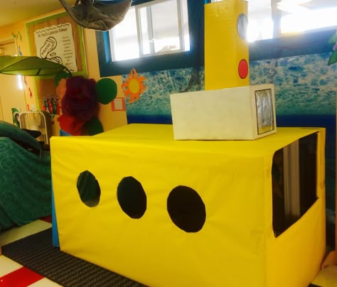 Yellow Submarine for the Dramatic play area in preschool Ocean Themed Dramatic Play Center, Submarine Dramatic Play, Dramatic Play Ocean Theme, Water Dramatic Play Ideas, Submarine Activities Preschool, Beach Dramatic Play Preschool, Ocean Dramatic Play Preschool, Boats Eyfs, Under The Sea Dramatic Play