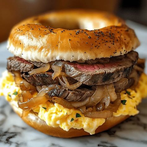 Copycat McDonald’s Steak Egg and Cheese Bagel – Naomi's Recipes Healthy Bagel Sandwich, Mcdonald's Steak Egg And Cheese Bagel, Steak Egg And Cheese Bagel, Cheese Bagel Recipe, Egg And Cheese Bagel, Mcdonalds Copycat Recipes, Shaved Steak, Healthy Bagel, Toasted Bagel