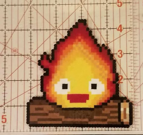 Howel's moving Castle's Calcifer made out of perler beads. Calcifer Perler Beads, Howls Moving Castle Perler, Calcifer Perler, Howls Moving Castle Perler Bead, Howls Moving Castle Pixel Art, Calcifer Pixel Art, Alpha Crochet, Anime Perler, Perler Creations