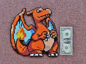 I did this big ass Charizard based off of sprites. It was way bigger than I thought it was gonna be. Charizard Perler Bead Pattern, Charizard Perler Beads, Big Perler Bead Patterns, Nerdy Perler Beads, Hama Beads Pokemon, Black Fingers, Pokemon Bead, Pixel Art Pokemon, Pokemon Pattern