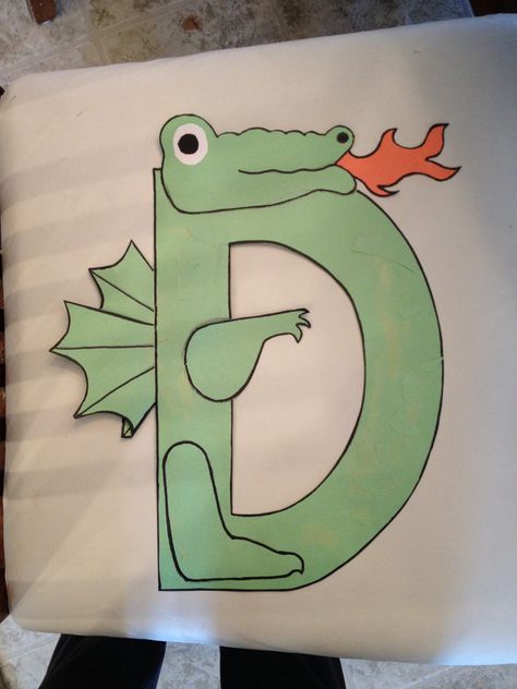 D is for dragon! D is for dragon, who is a skillful flyer. If you come too close, he'll toast you with his fire! Letter D Dragon Craft, D Is For Dragon Craft, D Is For Dragon, February Lessons, Dragon Crafts, Alphabet Crafts, Letter Of The Week, Preschool Letters, Color Sorting