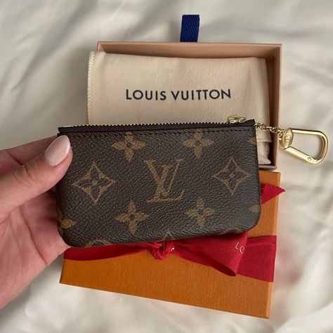 The Key Pouch in the coveted LV Monogram canvas. Louis Vuttion Key Pouch, Louis Vuitton Key Pouch Aesthetic, Louis Vuitton Keychain Wallet, Lui Viton, Lv Key Pouch, Lv Store, Louis Vuitton Key Holder, Louis Vuitton Wristlet, Brown Acrylic Nails