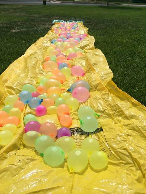 Water balloon filled slip and slide ✔️ So fun, definitely worth doing!!!! Slip N Slide Party, Hawaiian Mocktail, Backyard Sweet 16, Last Day Of School Fun, Girls Hangout, Themed Pool Party, Summer Kick Off, B Day Party Ideas, End Of The Year Party