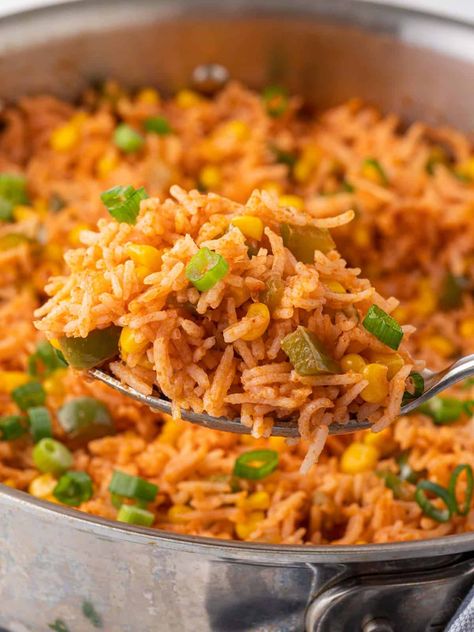 Learn how to make delicious Mexican Fried Rice with our easy recipe. Packed with bold flavors, this dish is perfect for quick weeknight dinners. Spanish Fried Rice, Mexican Fried Rice, Authentic Mexican Rice, Rice Dishes Easy, Protein Vegetarian Recipes, Mexican Rice Recipe, Rice Recipe Easy, Mexican Rice Easy, High Protein Vegetarian