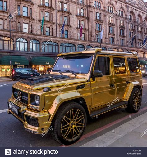 Download this stock image: Luxury car in gold paint, Mercedes Benz W463, G-Class, Brabus G850 6.0 Widestar, parked in front of Harrods department store - RA46MM from Alamy's library of millions of high resolution stock photos, illustrations and vectors. Luxury Jeep, Luxury Cars Inside, Gold Cars, Lowrider Show, Car Gold, Cars Inside, Car Side View, R34 Gtr, Gold Car