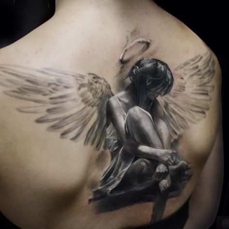 Angel tattoos look stunning and show the world your angelic side. Men and women often get them since they represent devotion, strength and chastity and can provide a sense of guidance. Angel Back Tattoo, Beautiful Angel Tattoos, Angel Tattoo For Women, Angels Tattoo, Halo Tattoo, Fallen Angel Tattoo, Wing Tattoo Designs, Angel Tattoos, Angel Wings Tattoo