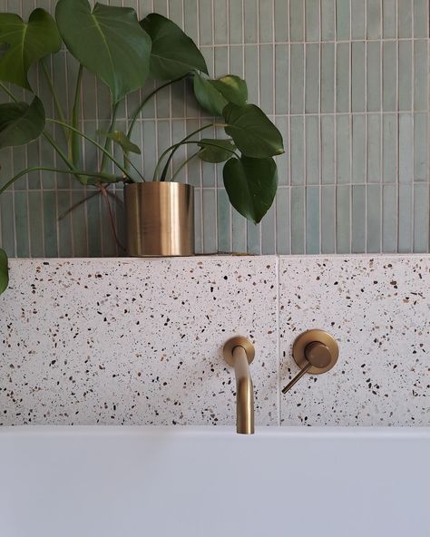 Loving the calm and serene vibe this space gives off. Our Kiepersol Alf tile with terrazzo tiles looks like a match made in heaven and @linelab_arch did good 😊 The masterfully designed ledge is a fantastic spot for a plant and even a painting which adds another layer of personality to this bathroom. We’re so glad to be able to share this with you. Terrazzo Floor Bathroom White Tiles, Terrazzo And Concrete Bathroom, Terrazzo Backsplash Bathroom, Light Green Bathroom Tile, Grey Bathroom Tiles Colour Schemes, Terrazzo Bathroom Ideas, Calm Bathroom Ideas, Terrazzo Bathrooms, Bathroom Tile Color Schemes