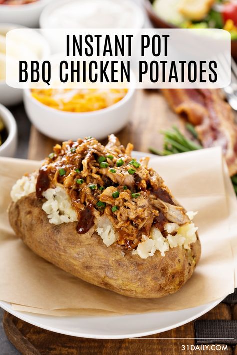 Comfort food at its best. Fluffy baked potatoes, tangy and tender barbecue chicken, and all the toppings! Instant Pot BBQ Chicken Baked Potatoes #instantpot #bakedpotatoes #bbq #bbqchicken #31Daily Barbecue Chicken Baked Potato, Barbecue Baked Potato, Shredded Chicken Baked Potato, Bbq Chicken Baked Potato, Pressure Cooker Bbq Chicken, Fluffy Baked Potatoes, Baked Potatoes In The Oven, Instant Pot Bbq Chicken, Potatoes Loaded