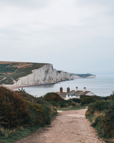 How to visit the Seven Sisters in England? Save this post for your next trip to England.     Received a lot of questions about this spot, so here’s some more info on how to visit the Seven Sisters!  The Seven Sisters are a series of stunning white chalk cliffs located between Seaford and Eastbourne in the South Downs National Park. Definitely a must-see if you’re traveling through southern England.  While there are several viewpoints, the most breathtaking one is Seaford Head. There you ca... Seaford England, Seven Sisters Cliffs, Cloud Bedroom, Trip To England, The Seven Sisters, Scotland Vacation, Southern England, South Downs, Seven Sisters