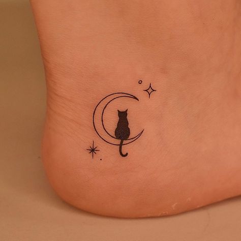 Explore the intricate world of small tattoos with our detailed guide. From choosing designs to finding the perfect spot, get ready to ink your story. Small Moon Tattoos, Cat Tattoo Simple, Helloween Wallpaper, Small Girly Tattoos, Cat Tattoo Small, Minimal Tattoo Design, Black Cat Tattoos, Moon Tattoo Designs, Tasteful Tattoos