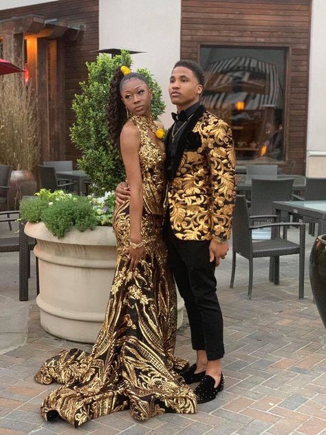 Black And Gold Prom Couple Outfit, Black And Gold Formal Outfit Men, Gold Tuxedo Prom, Black And Gold Prom Dress Couple, Black And Gold Tuxedo Prom, Gold Prom Suits For Men, Gold Prom Outfits For Couples, Black And Gold Prom Couple, Brown Prom Suit