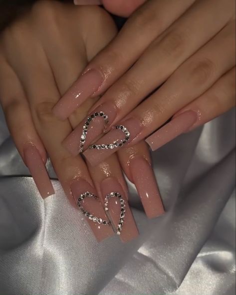 Medium heart nude nails acrylics #nails #acrylics #heart Heart Nails Gems, Nails Acrylic Coffin Gems, 11 11 Nails, Heart On Two Nails, Acrylic Square Nails Medium, Acrylic Nails Heart Gems, Coffin Acrylic Nails Heart, Heart Gems Nails, Nail Inspiration Square Medium