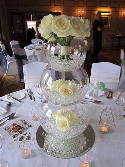 Fish Bowl Centerpiece Wedding, Center Table Decorations, Simple Floral Centerpieces, Wedding Decorations Diy Centerpiece, Christmas Bazaar Crafts, Center Table Decor, Unique Wedding Centerpieces, Floral Arch Wedding, Tall Wedding Centerpieces