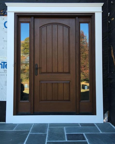 We've got the best front door ideas for your home makeover, like this brown front door with white trim! Dark Stained Front Door, Chocolate Brown Door, Brown Front Door, Stained Front Door, Front Door With Sidelights, Brown Front Doors, Door With Sidelights, Front Door Ideas, Best Front Doors