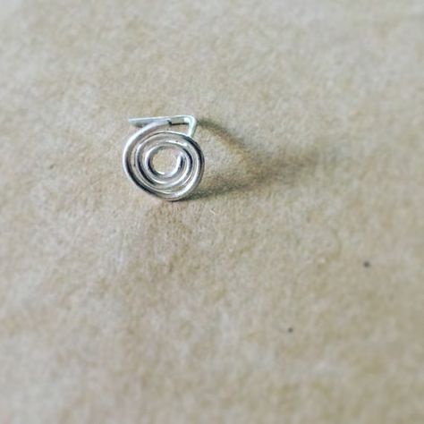 Simple adorable spiral nose stud. This is a perfect nose ring that goes with everything. The flat spiral design lays flat against the face, making Spiral Nose Ring, Disney Charm Bracelet, Sterling Silver Nose Rings, Boho Cuff Bracelet, Perfect Nose, Petite Earrings, Boho Cuff, Silver Nose Ring, Swarovski Crystal Hearts