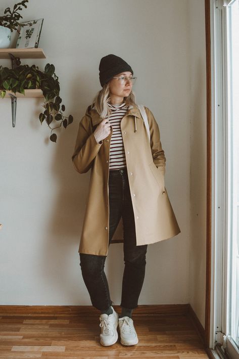 Stutterheim Raincoat Review + 5 Styling Ideas | Truncation    #stutterheimraincoatreview #everlanesneakers #gapdenim #stripedturtleneck #madewellstyle Outfit With Raincoat, Stutterheim Raincoat Women, Rains Raincoat Outfit, Khaki Raincoat Outfit, Raincoat Outfit Woman, Stutterheim Raincoat Outfit, Styling A Raincoat, Tan Rain Coat Outfit, Cute Rain Coats For Women