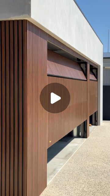 TOWER GARAGE DOORS AUSTRALIA on Instagram: "Another garage door masterpiece 

Sleek flush mount sectional garage door finished with premium @knotwoodaustralia Kwila 38 x 16 battens, delivering a seamless blend of sophistication and modern design." Sectional Garage Doors, Garage Door, Flush Mount, Garage Doors, Sectional, Modern Design, Garage, New Homes, Tower