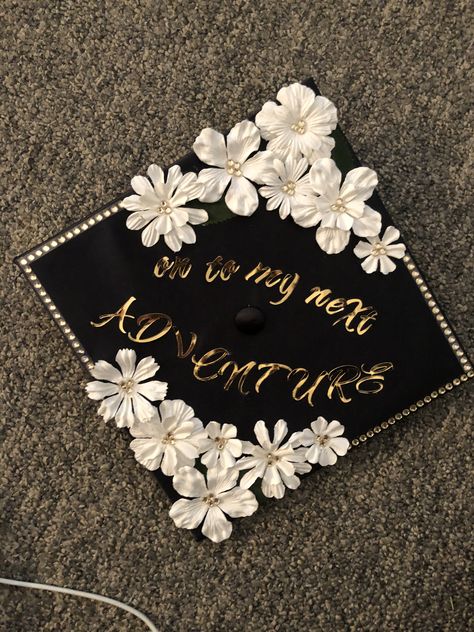 Graduation cap. On to my next adventure. Floral. Gold. Graduation Cap Designs Simple Flowers, Computer Science Graduation Cap Ideas, Onto My Next Adventure Grad Cap, Graduation Cap Ideas Simple, Boho Grad Cap Ideas, Decorative Graduation Cap Ideas, On To My Next Adventure Grad Cap, Simple Cap Designs For Graduation, Grad Caps With Flowers