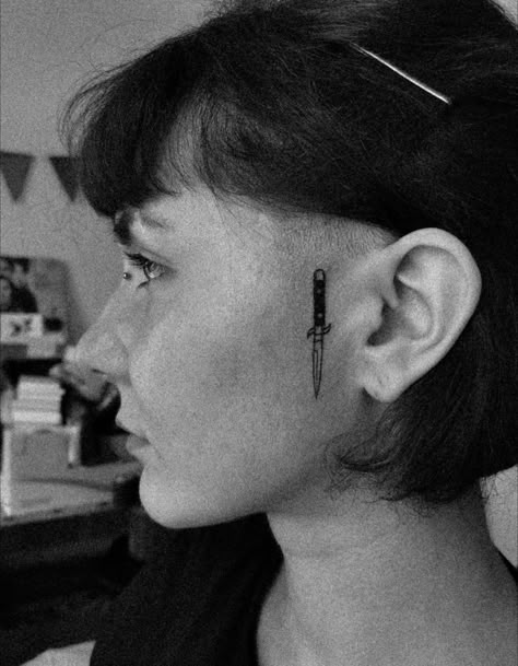 Grunge Face Tattoos, Knife Tattoo Behind Ear, Face Tattoo Near Ear, Knife Behind Ear Tattoo, Next To Ear Face Tattoo, Face Tattoo By Ear, Knife With Face Tattoo, Unique Face Tattoos, Face Tattoo Women