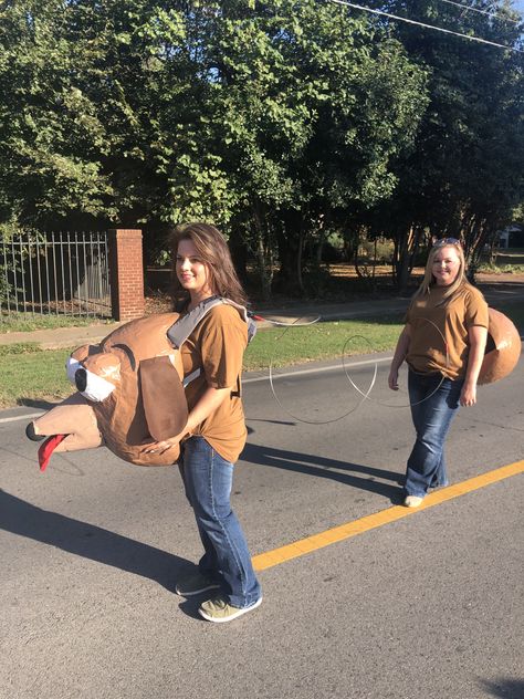 Lotso Toy Story Costume, Diy Slinky Dog Costume For Adults, Dog Parade Float Ideas, Toy Story Homecoming Float, Toy Story Float Ideas, Toy Story Parade Float Ideas, Slinky Toy Story Costume, Diy Slinky Dog Costume, Toy Story Costumes Diy