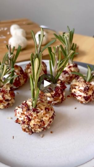 1.2K reactions · 372 shares | Cranberry Pecan Goat Cheese Balls 🥳 Not only are they adorable with the rosemary “toothpick” but they are so tasty. If you don’t like goat cheese you can sub cream cheese. Perfect finger food for the holidays.✨Save to make later ~by @sailor_bailey . What’s in them:::: 1 small log of goat cheese (chèvre) 1/3 cup cranberry 1/3 cup pecans 1/4 tap salt & pepper fresh rosemary Chop up the pecans and cranberries, roll the goat cheese into .5 inch balls, roll them into the nut/seasoning mix. Stick a toothpick or a small sprig of fresh rosemary in them and enjoy! . #appetizers #snack #thanksgiving #food #goatcheese #foodinspiration #foodislife #yummy | Sharing Delicious Food | befitsnacks · Original audio Goat Cheese Balls, Sailor Bailey, Mini Goats, Nut Rolls, Pecan Nuts, Rosemary Sprigs, Cheese Balls, Thanksgiving Food, The Goat