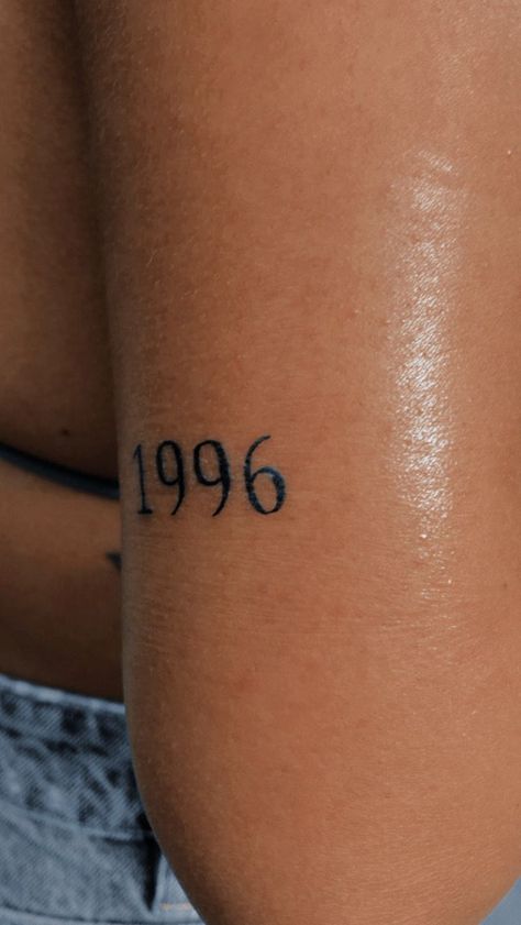 Year Fine Line Tattoo, Year Tattoo On Arm, 1996 Tattoo Design, 1996 Tattoo Ideas Women, Birth Date Tattoos For Women, 1996 Tattoo Ideas, Birth Year Tattoo Ideas Ankle, Minimalist Arm Tattoos For Women, 1979 Tattoo