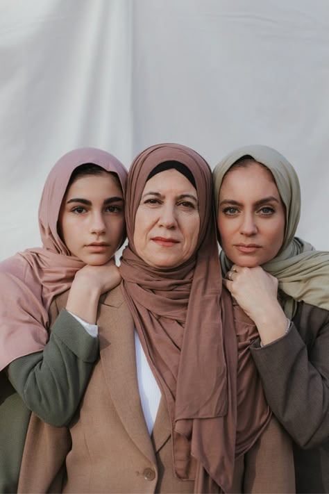 3 Generations. 1 Scarf. Shop our inclusive sizing now Hijab Editorial, Family Generations, Family Photo Studio, Jersey Collection, Scarf Shop, Jersey Hijab, Muslim Family, Family Posing, Portrait Poses