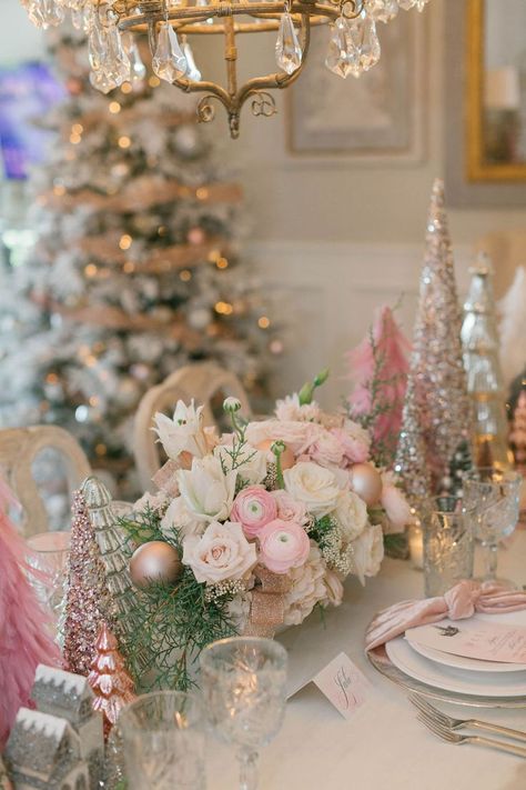 Inspired by the color pink, we created a nontraditional Christmas tablescape! #pinkchristmas #pinkchristmascenterpiece #christmasparty #christmasdecor #christmasflowers #christmastreedecor #holidayinspo #pinkplacesetting #prettyinpink Pink Winter Tablescape, Red And Pink Christmas Tablescape, Pink Holiday Tablescape, Pink Christmas Table Centerpieces, Pink Christmas Floral Arrangements, Pink Christmas Party Decorations, Pink Christmas Centerpieces, Pink Christmas Tablescapes, Pink Christmas Table Decor