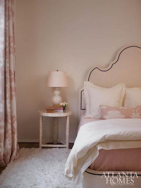 Pale pink walls frame a stunning light pink nailhead headboard bed dressed in pink bedding, an ivory duvet, ivory shams, and Mary McDonald Garden of Persia Blush Fabric that match the window curtains. Dusty Pink Bedroom, Grown Up Bedroom, Pink Paint Colors, Pink Curtains, Classic Interior Design, Atlanta Homes, Beach House Design, Hello Lovely, Farmhouse Bedroom Decor