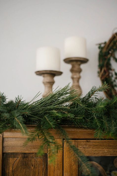 DIY Foraged Natural Evergreen Garland - The Rooted Farmhouse | Gardening, Canning & Simple Living Foraged Garland, Baloon Garland, Evergreen Garland, Christmas Tree Lots, Neutral Christmas Decor, Neutral Christmas, Pine Wreath, Simple Christmas Decor, Farmhouse Garden