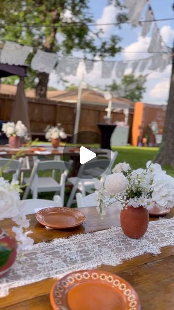 Designs by Yutz on Instagram: "Hacienda vibes🪔🤍  Mexican theme but make it timeless✨Instead of using lots of vibrant colors we went with whites & barro touches! What do think?   Full production by the DBY team!💪🏻 For this event we installed the following rentals:   -Farmhouse de eq Tables -Garden chairs -Centerpieces & Table Decor -Custom Bars -Backdrop Decor -Lounge Sofas -Cocktail Tables -String Lights -White Mexican Banners  ——————————————————————————— For inquiries please visit our website and fill out the contact form! Looking forward to help you make your next celebration one to remember!💕⠀  #DesignsbyYutz #HaciendaParty #CielitoLindoParty #CielitoLindoTheme #HaciendaTheme #CielitoLindoDecor #MexicanParty #MexicanTheme #MexicanDecor #EventDecor #HoustonParties #HoustonEvents #Ho Mexican Theme Party Decorations Centerpieces, Elegant Mexican Theme Party Table Settings, Mexican White Party, Cielito Lindo Theme Wedding, White Mexican Party Decor, Pink Cielito Lindo Theme, Mexican Hacienda Wedding Decor, Hacienda Wedding Decor Centerpieces, Mexican Anniversary Party Ideas