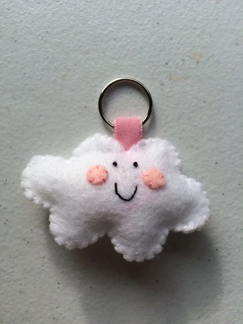 A keychain made of felt in the form of a cloud, which is not difficult to sew Homemade Keychain, Felt Cloud, Handmade Dolls Patterns, Felt Keychain, Blessed Mary, Hobbies That Make Money, Plushie Patterns, Diy Crafts To Do, Plush Pattern