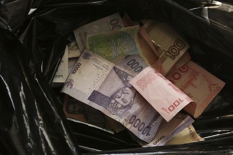 High angle closeup shot of cash money in... | Free Photo #Freepik #freephoto #pay-money #cash-money #money-bag #money-bill Kota Bandung, Cash Money, High Angle, Trash Bag, Money Cash, Money Bag, Free Photo, Free Photos, Close Up