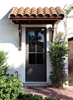 Spanish Style Front Door, Spanish Home Exteriors, Window Pergolas, Awning Over Door, Door Overhang, Spanish Exterior, Mediterranean Homes Exterior, Spanish Colonial Homes, Spanish Style Architecture