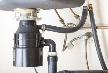 How to Install a Garbage Disposal in a Single Sink | Home Guides | SF Gate Unclog Garbage Disposal, Cleaning Disposal, Garbage Disposal Installation, Kitchen Sink Plumbing, Garbage Disposal Cleaning, Single Sink Kitchen, Pex Plumbing, Pex Tubing, Bowl Kitchen Sink