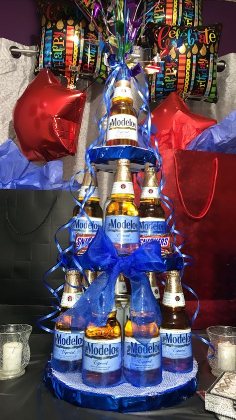 Modelo Beer Cake Ideas, Beer Bottle Cakes For Men, Modelo Gift Idea, Modelo Beer Cake For Men, Modelo Cake Beer, Beer Bouquet For Him, Beer Tower Cake, Beer Cake Gift, Modelo Cake