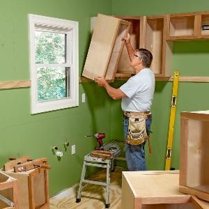 Tips from the Pros: Installing Kitchen Cabinets. Installing Kitchen Cabinets, Cabinet Installation, Upper Kitchen Cabinets, Wooden Things, Kitchen Wall Cabinets, Hanging Cabinet, New Kitchen Cabinets, Installing Cabinets, How To Hang