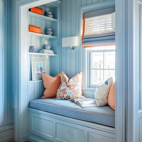 Blue Coastal Reading Nook with Orange Accents [Room Concept] Coastal Color Scheme, Cozy Window, Cozy Window Seat, Paneled Walls, Room Concept, Wallpaper Walls Decor, Tile Wallpaper, Orange Accents, Living Room Windows